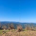 full view of the deployed antenna on a mountain top