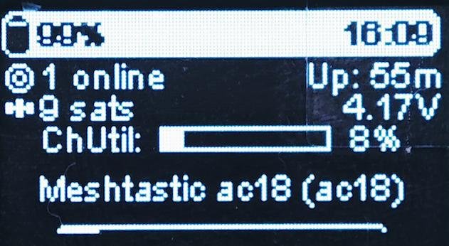 Meshtastic node main OLED status screen showing battery, GPS sats, voltage, channel utilization, and node name