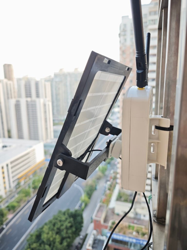 Final balcony‑mounted Meshtastic solar base station overview