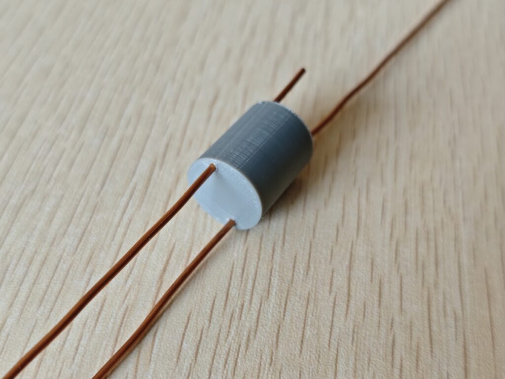 3D printed spacer installed on copper wire for homemade J-Pole antenna
