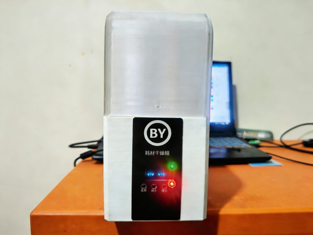Close-up of PID filament dryer OLED control panel with menu and adjustment buttons
