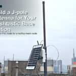 Feature image showing a rooftop LoRa Meshtastic base station with a homemade PVC J-Pole antenna and solar panel