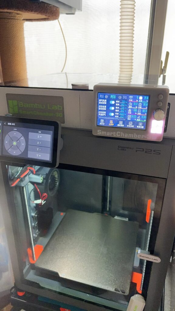 SmartChamber-3D installed on an enclosed 3D printer with display and exhaust tubing visible