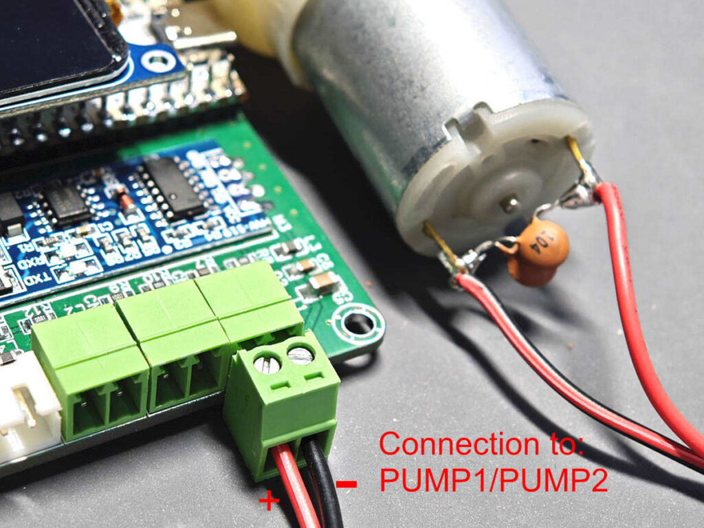 PlantLab 5V pump connected to screw terminal output with black and white DC wires