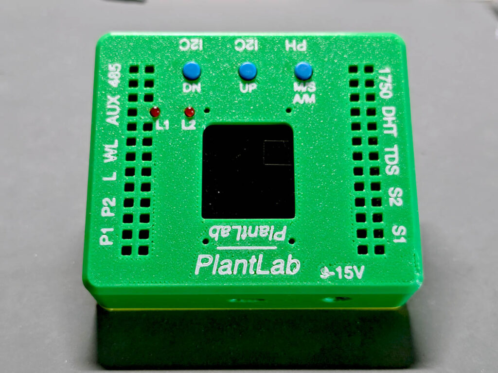 Finished PlantLab controller in green 3D-printed case with blue button caps