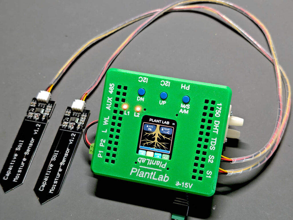 PlantLab first power-on test with TFT display and two soil moisture sensors connected