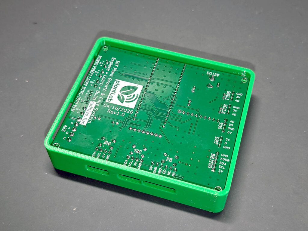 Rear side of PlantLab 3D-printed case showing connector access openings