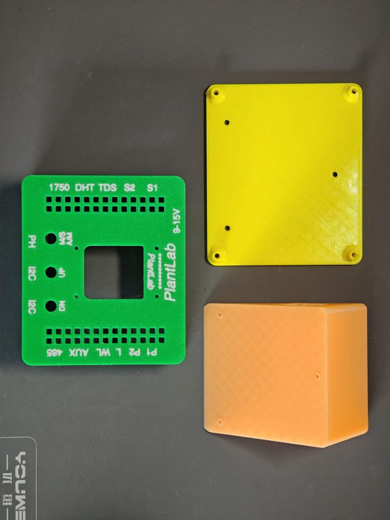 Printed PlantLab enclosure parts including front shell cover and pump holder